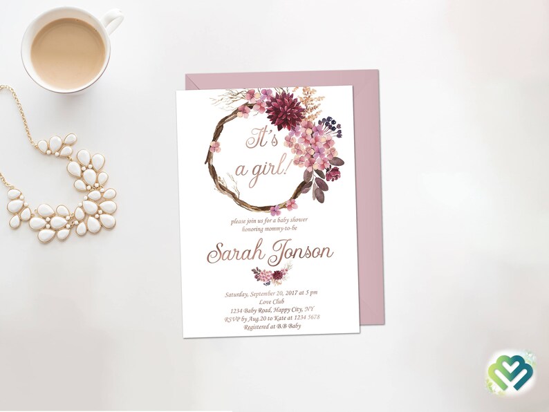 May include: A pink and white floral baby shower invitation with a wreath and the text "It's a girl!"  Please join us for a baby shower honoring mommy-to-be Sarah Jonson. Saturday, September 21, 2017 at 5pm. Love Chub, 1234 Baby Road, Happy City, NY. RSVP by: Aug 20 to 1234 5678. Registered at BB Baby.