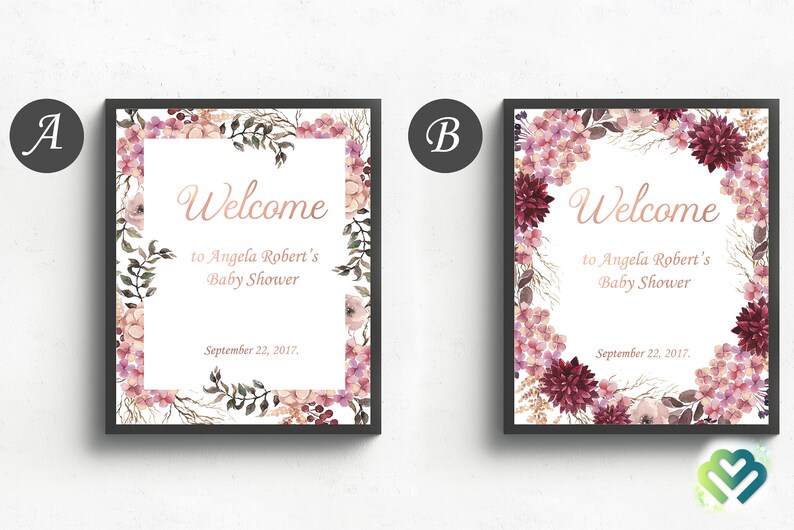 May include: Two printable welcome signs for a baby shower with floral borders. The signs feature the text "Welcome to Angela Robert's Baby Shower" and the date "September 22, 2017".