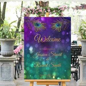 May include: Welcome to the wedding of Jessica Stuart & Robert Smith, December 20th, 2015. A purple and green wedding sign with gold glitter peacock feathers.