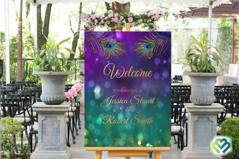 May include: Welcome to the wedding of Jessica Stuart & Robert Smith, December 20th, 2015. A purple and green wedding sign with gold glitter peacock feathers.