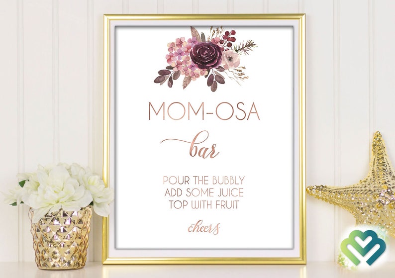 May include: Printable sign for a "Mom-osa Bar" with a watercolor floral design in shades of pink and purple. The sign reads "Pour the bubbly, add some juice, top with fruit, cheers".
