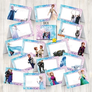 May include: A collection of folded rectangular place cards featuring characters from the movie Frozen, including Elsa, Anna, Kristoff, Olaf, and Sven. Each card has a white central area for writing, surrounded by blue and purple snowflake borders.