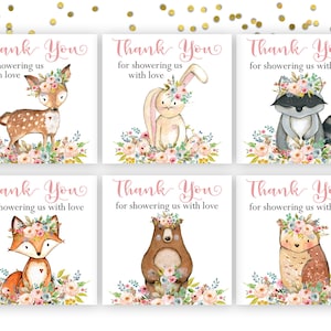 May include: Set of six baby shower thank you cards. Each card features a different watercolor woodland animal wearing a floral crown. The text "Thank You for showering us with love" is written in pink script.