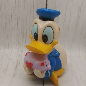 Vintage Disney Donald Duck Bank Holding a Piggy Bank Plastic Walt Disney Production (11)