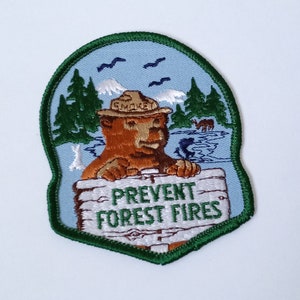 Vintage Smokey The Bear Patch &quot;Prevent Forest Fires!&quot; Stream Mountains Deer New Old Stock  (1@4)
