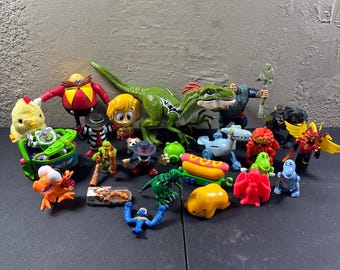 Lot 24 Figurines Mixed Brands and Charactors