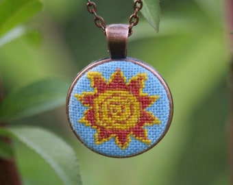Embroidered Sun Necklace: Boho Chic Cotton Pendant
