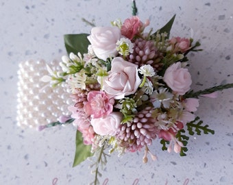 Mixed Pinks Boutonnieres And Matching Wrist Corsage With An Array Of Faux Flowers And Foliage