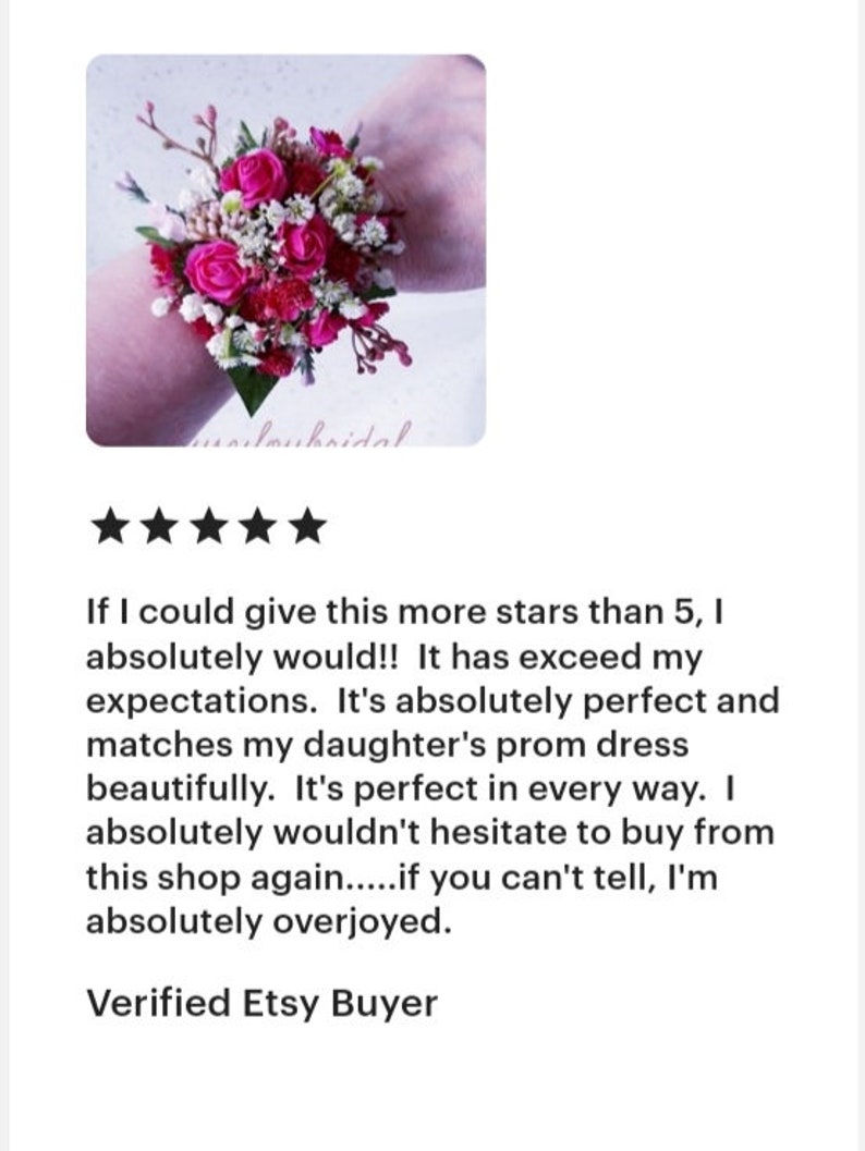 May include: A pink and white flower wrist corsage with pink roses, white baby's breath, and green foliage.  "If I could give this more stars than 5, I absolutely would!! It has exceed my expectations. It's absolutely perfect and matches my daughter's prom dress beautifully. It's perfect in every way. I absolutely wouldn't hesitate to buy from this shop again.....if you can't tell, I'm absolutely overjoyed. Verified Etsy Buyer"