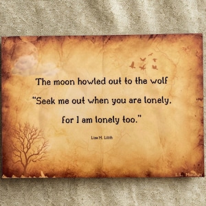 May include: A rectangular print with a vintage parchment paper appearance. The text reads, "The moon howled out to the wolf, Seek me out when you are lonely, for I am lonely too." A bare tree and flying birds are also depicted.
