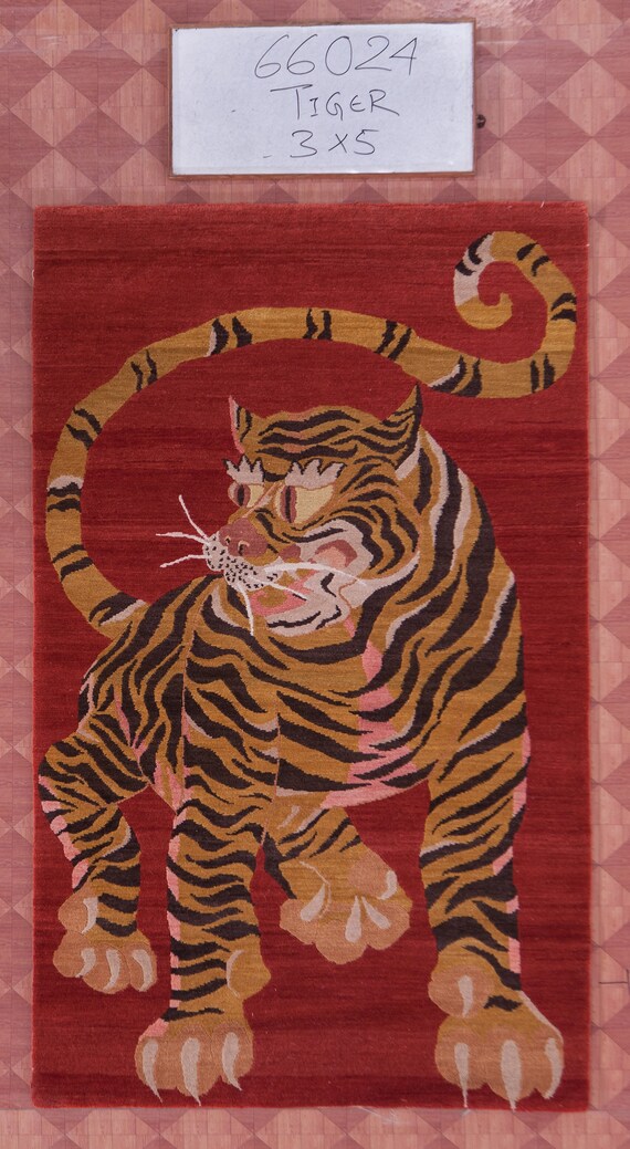 tibetan tiger rug. all natural dyes , handspun wool yarn from Tibet. 3x5 ft. nepal.