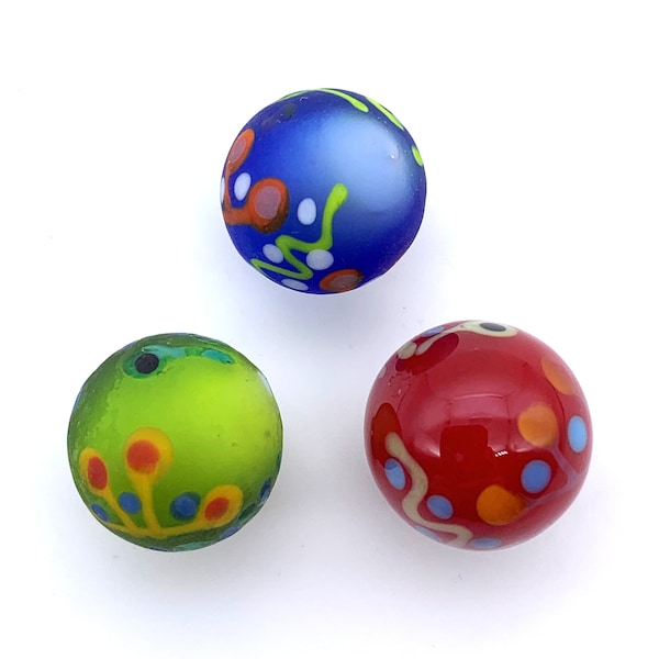 New for 2021! "Inca" 16mm Handmade Art Glass Player Marbles w Stands Choice of Single or Set of 3 Assorted Red Green Blue w Colored Patterns