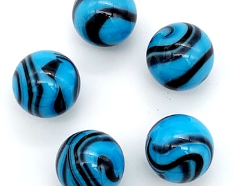May include: Five blue glass marbles with black swirling patterns. The marbles are round and smooth.