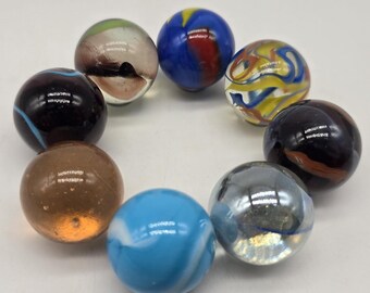 NEW FOR 2025! 25mm 1'' Set of 8 Glass Shooters: Air, Rocket, Astronaut, Bigfoot, Great White Shark, Atom, Molecule, Axolotl