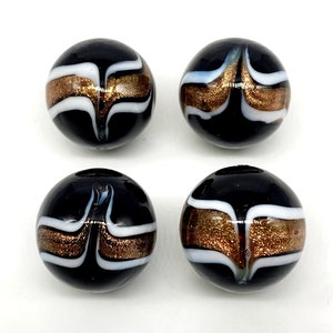 New for 2022!!  &quot;Insignia&quot; 22mm Handmade Art Glass Shooter Marbles (7/8&quot;) Pk of 4 Black w Golden Bronze Sparkling Wraparound Design w Stands