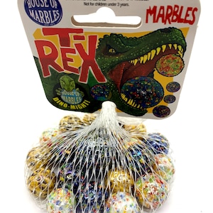 May include: A bag of colorful marbles with a T-Rex Dino-Mighty House of Marbles packaging. The packaging features a green T-Rex with a yellow background and the text "House of Marbles" and "Dino-Mighty".