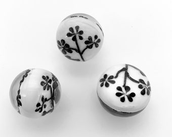 New for 2021! "Mahalo" 22mm Handmade Art Glass Shooter Marbles Choice of Single Marble or Set of 3: Clear Shell w White Base & Black Flowers