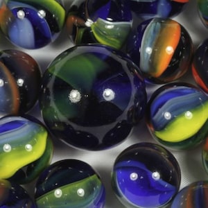 Tornado 25mm Glass &quot;Early Edition&quot; Single Shooter Marble Transparent Dark Blue Base w Red Yellow & White Vanes 2000-2001 Retired RARE! Vacor