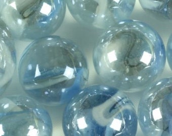 May include: A collection of blue glass marbles with white swirls. The marbles are translucent and have a glossy finish.