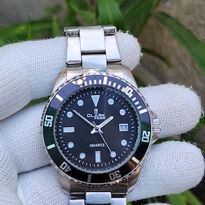 WH177 - CLARK FORD, Quartz, diver watch, rotating bezel, luminous hands and markers, all original