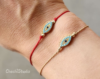 Złota bransoletka sznurkowa z motywem złego oka, regulowana biżuteria przyjaźni