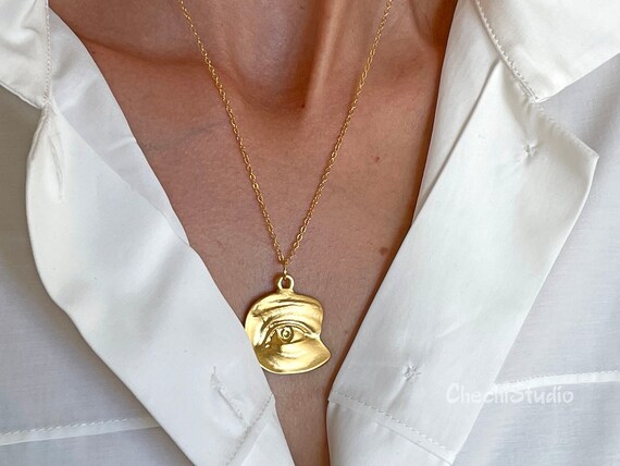 Seeing eye shop necklace