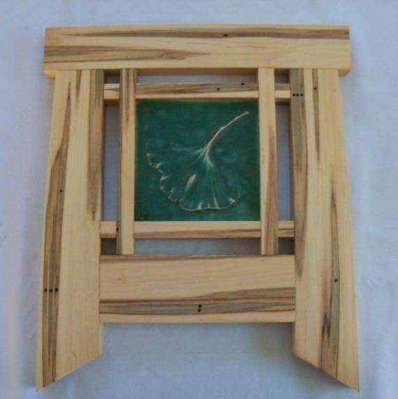 Any small contractors' style tablesaw will do the job. framed arts craft tile mission style frame wood frame framed tile craftsman frame arts and craft style ginkgo leaf tile maple frame
