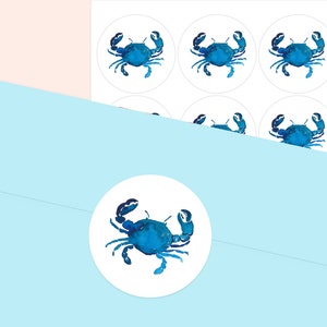 May include: A sheet of round stickers with a blue watercolor crab design. The stickers are perfect for adding a touch of nautical charm to your crafts, gifts, or party favors.