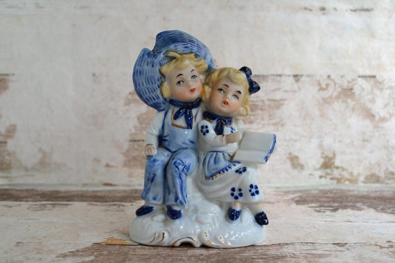 blue boy porcelain figurine