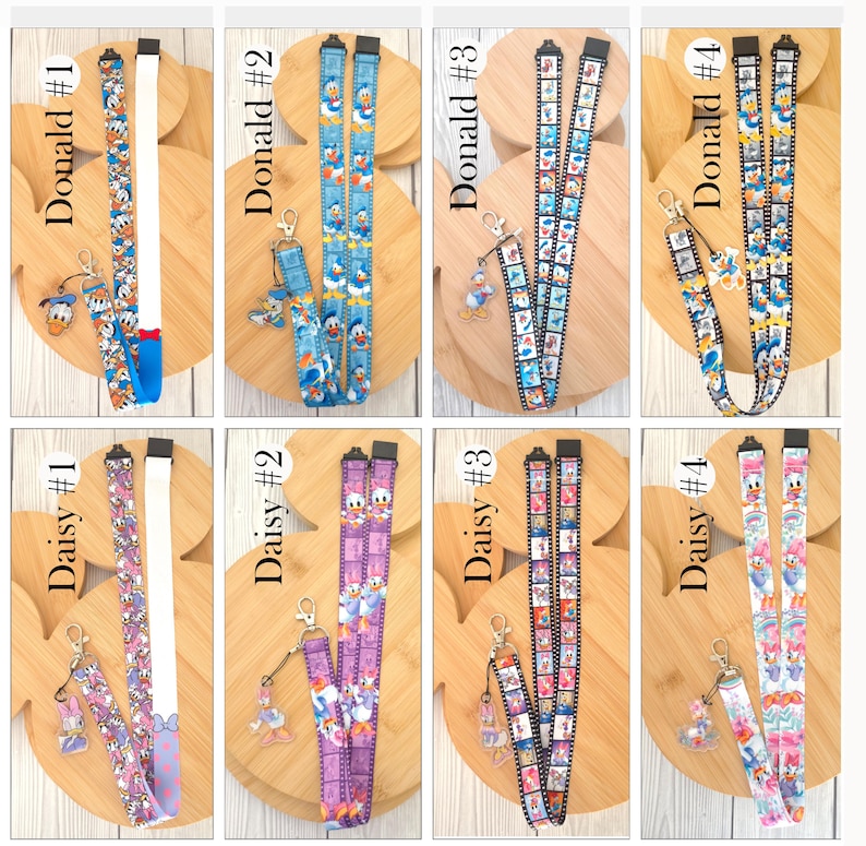 May include: A collection of eight fabric lanyards featuring Donald Duck and Daisy Duck character prints. Each lanyard includes a metal lobster clasp and a matching acrylic charm. The designs vary in color, including blue, purple, and white patterns.