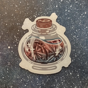 May include: A sticker featuring a potion bottle with a cork stopper. The bottle contains a swirling, reddish-brown liquid with blue and white accents. White cross-shaped designs are scattered around the bottle, and the sticker has a white border.