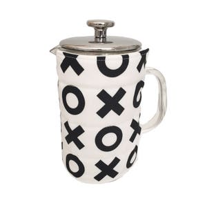 May include: A white and black patterned French press coffee maker with a stainless steel lid.