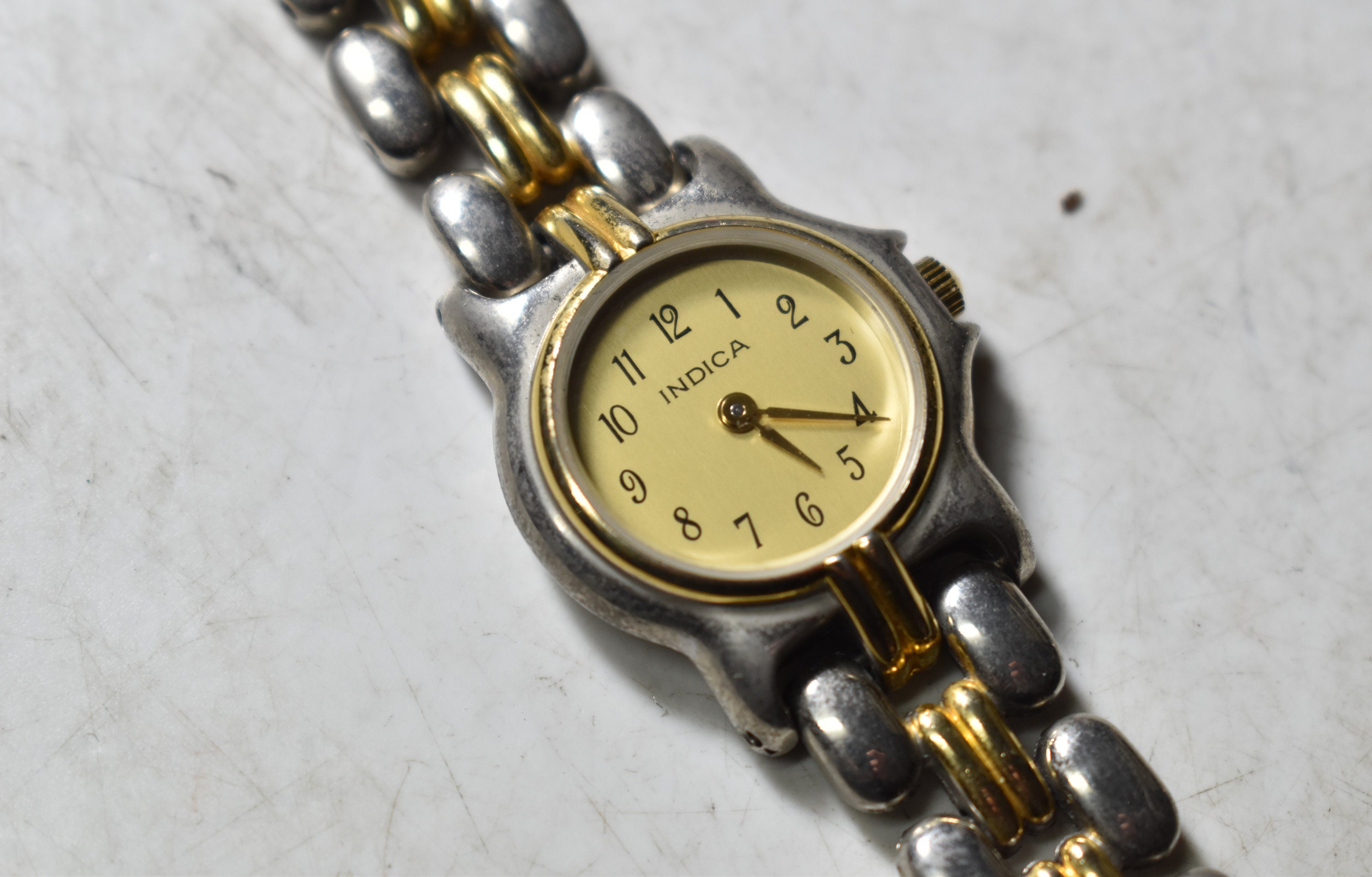 Gold indica watch price sales