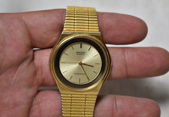 Orient quartz top watch price