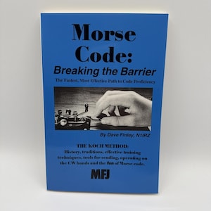 May include: A blue book titled "Morse Code: Breaking the Barrier" with text and a black and white image of a hand using a Morse code key. The book cover also includes the author's name and the publisher's logo.