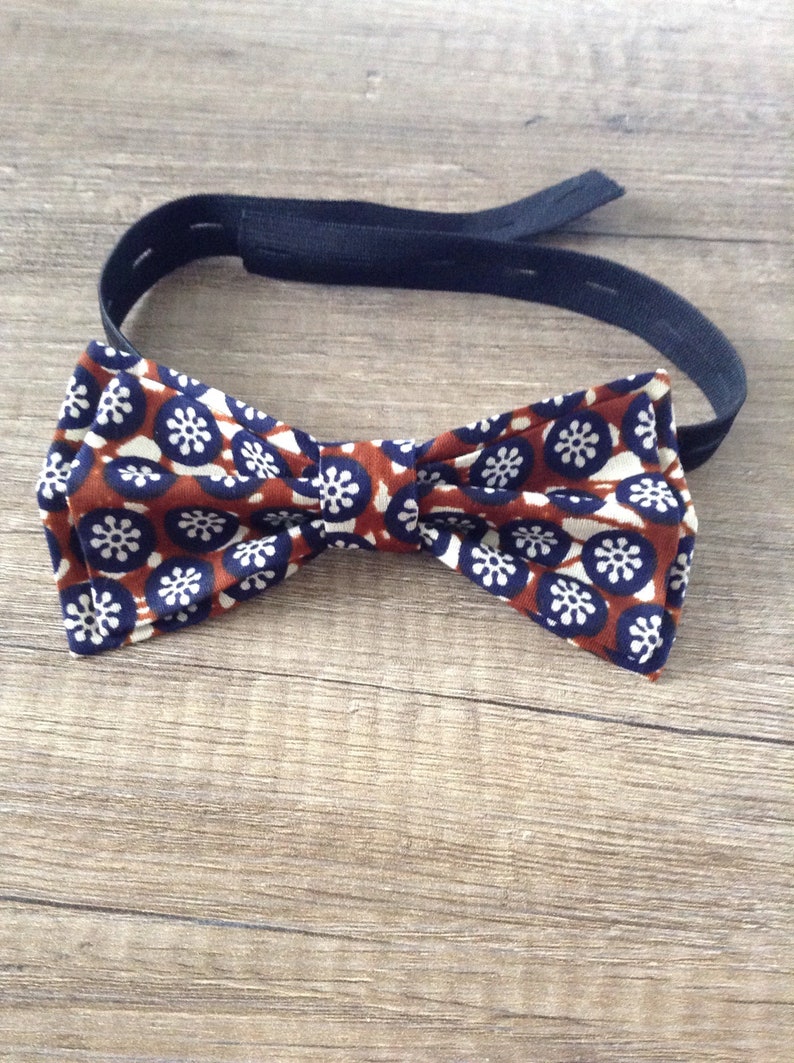 Unisex double bow made of wax
