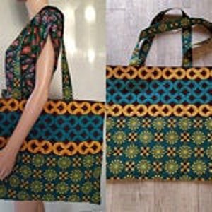 Große Wachs-Strandtasche mit Innentasche und Wachsgrafik-Dominanz-Vette