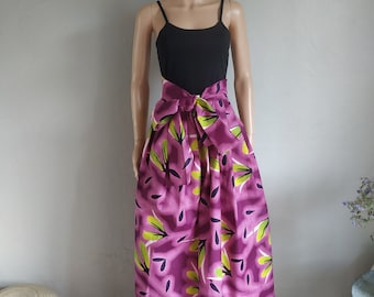 Maxi or short skirt length options pleated at the waist in floral wax