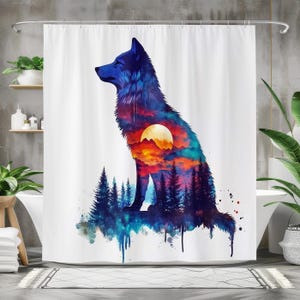 May include: A white shower curtain featuring a watercolor illustration of a wolf. The wolf's silhouette is filled with a sunset scene of mountains, trees, and a full moon. The color palette includes blues, oranges, and purples.