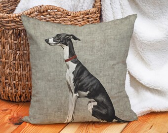 May include: A grey linen cushion featuring a black and white illustration of a Greyhound dog sitting on a grey background.