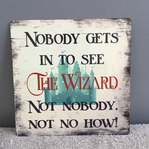 Metal wizard of oz nobody gets to see the wizard hanging sign