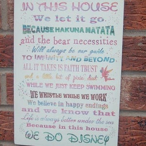 Disney quotes in this house we let it go Wooden Sign