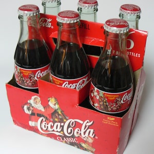 6 Pack 1998 Christmas Coca Cola Classic Sealed Glass Bottles 8 oz. Santa Coke Holiday