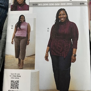 May include: A sewing pattern package featuring a woman modeling different outfits. The package includes the text "KNOWME by Mimi G" and "SIZE W3 (30W-32W-34W-36W-38W)". The package is designed and printed in the USA.