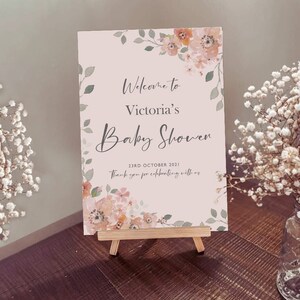 Baby Shower - Signe de bienvenue - Blossom Design en rose et pêche - Impression d’affiche personnalisée sur carton pour votre chevalet ou encadré.