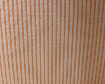 Orange Seersucker Stripe Fabric Finders 100 percent Orange Cotton Seersucker one eighth Stripe Fabric 60 inch width Fabric by the Yard