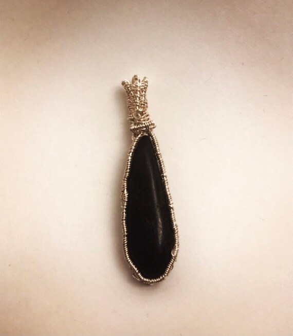 Polished black stone necklace pendant Etsy