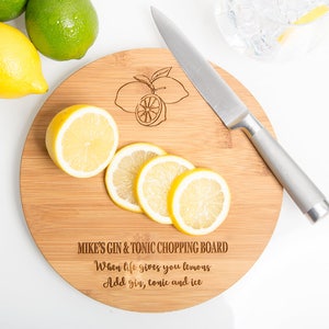 A personalised engraved bamboo wooden drinks chopping board.