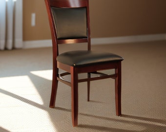 Set of 2 Custom Solid Wood Dining Chairs w/ designer leather material. *Standard Black Vinyl option can be purchased 1 each at a time*.