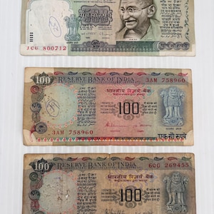 Lote de 3 billetes antiguos y coloridos de 500 y 100 rupias de la India.